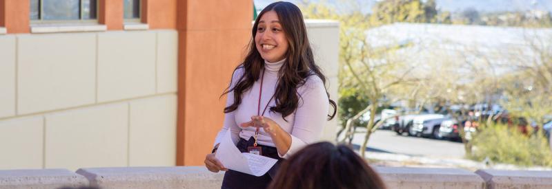 A student employee smiles giving a tour of Northwest Campus
